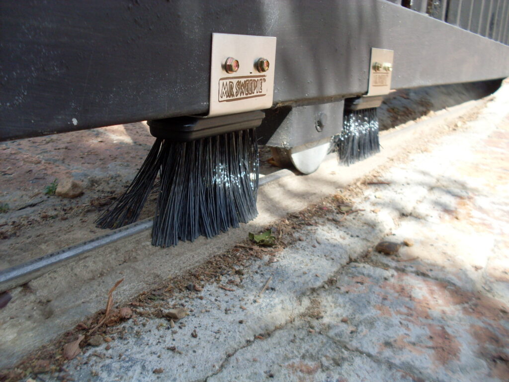 Mr. Sweepie® sliding gate track brush kit - sold in pairs, easy DIY install, extends gate motor life.